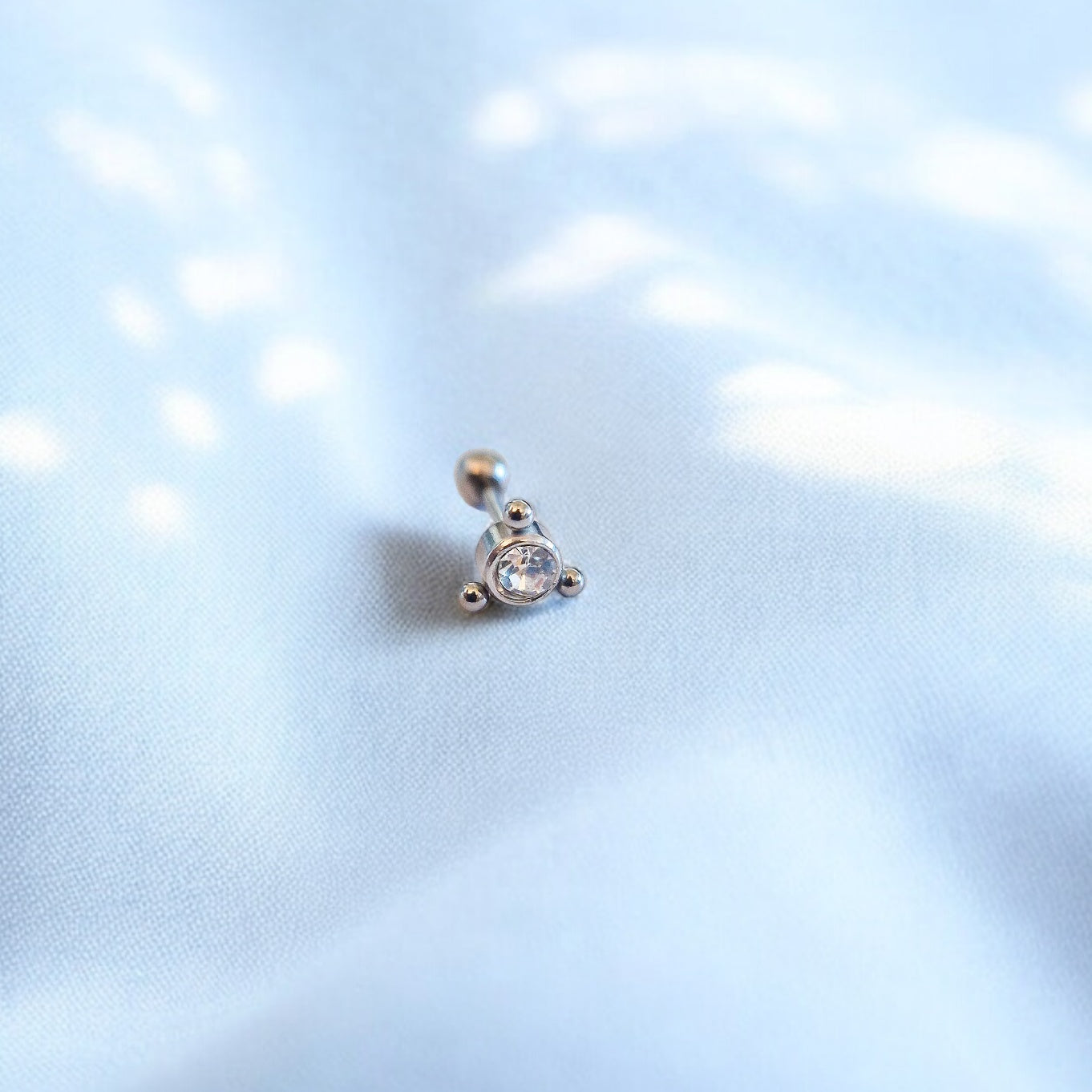 Piercing Cariddi punto luce