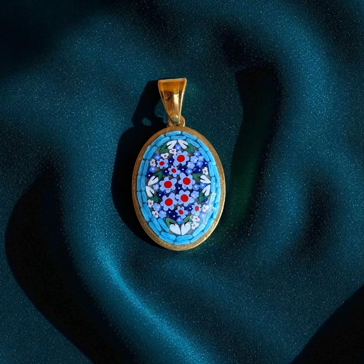 Ciondolo azzurro oro