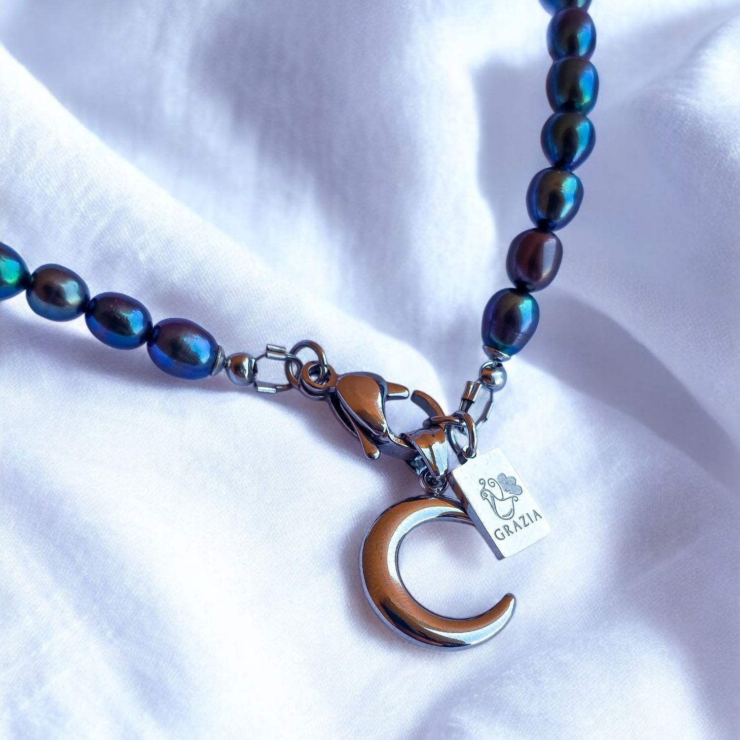 Perle di fiume nero-blu