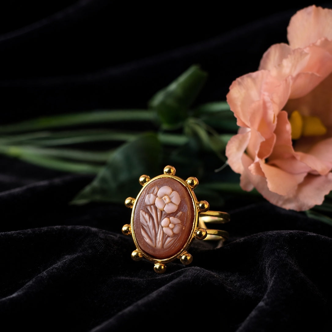 Fiori del male, V - cammeo in oro