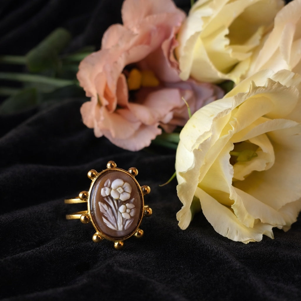 Fiori del male, V - cammeo in oro