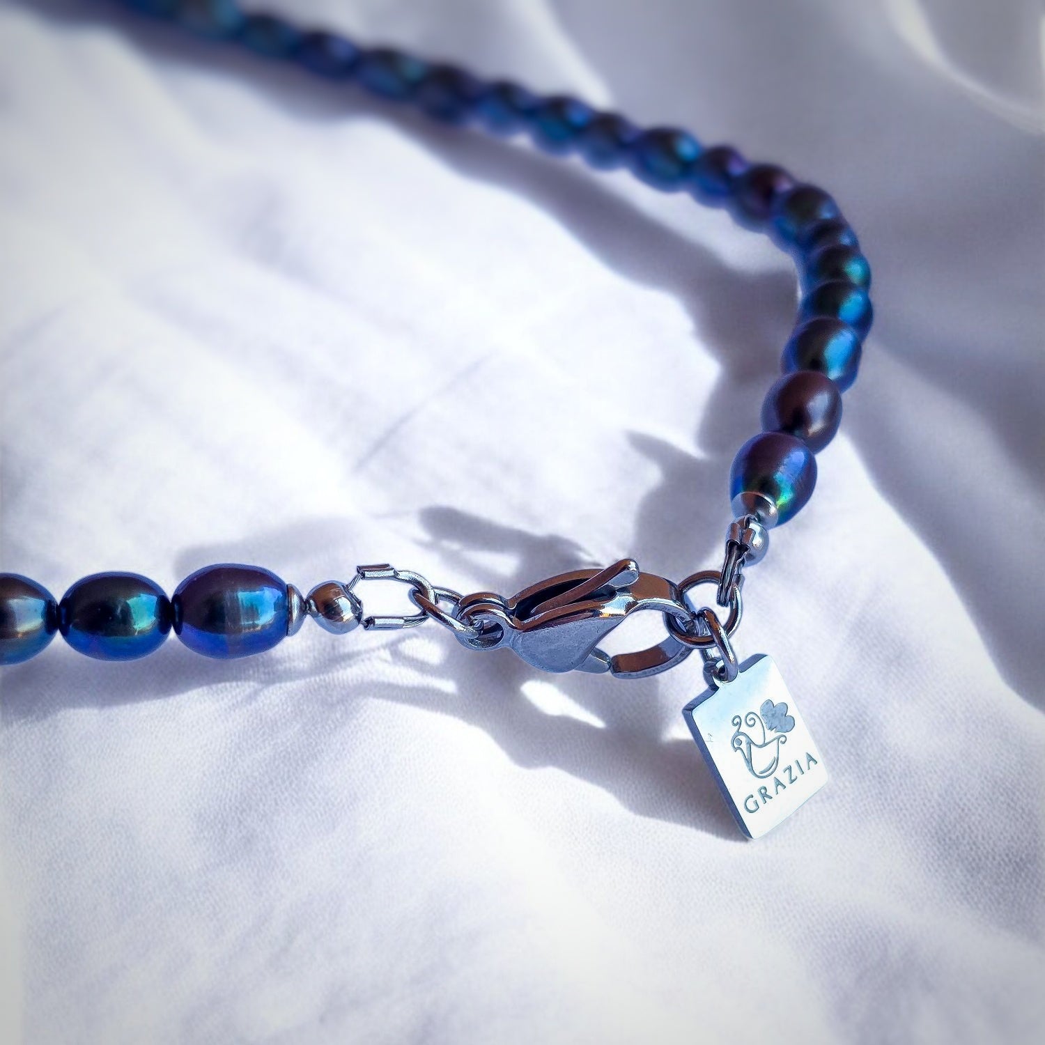 Perle di fiume nero-blu