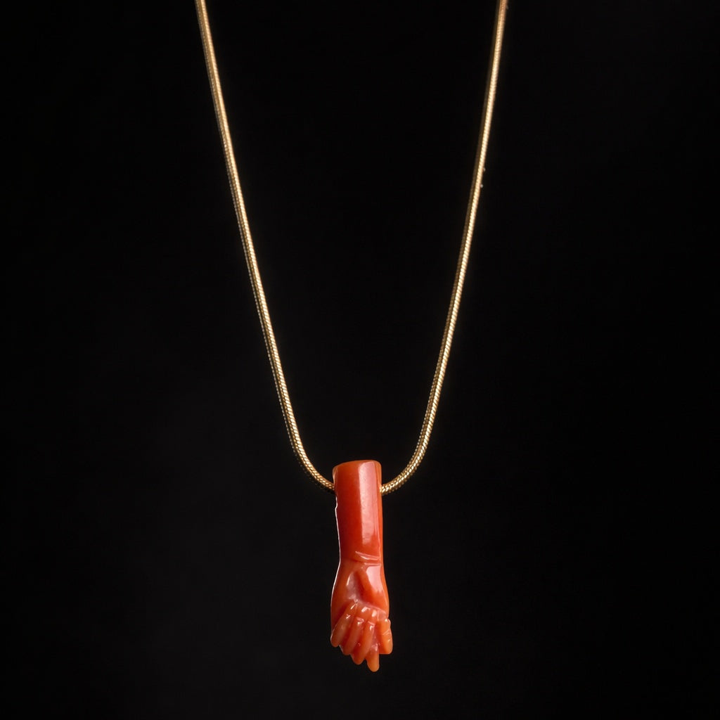 MANVS FICA in corallo