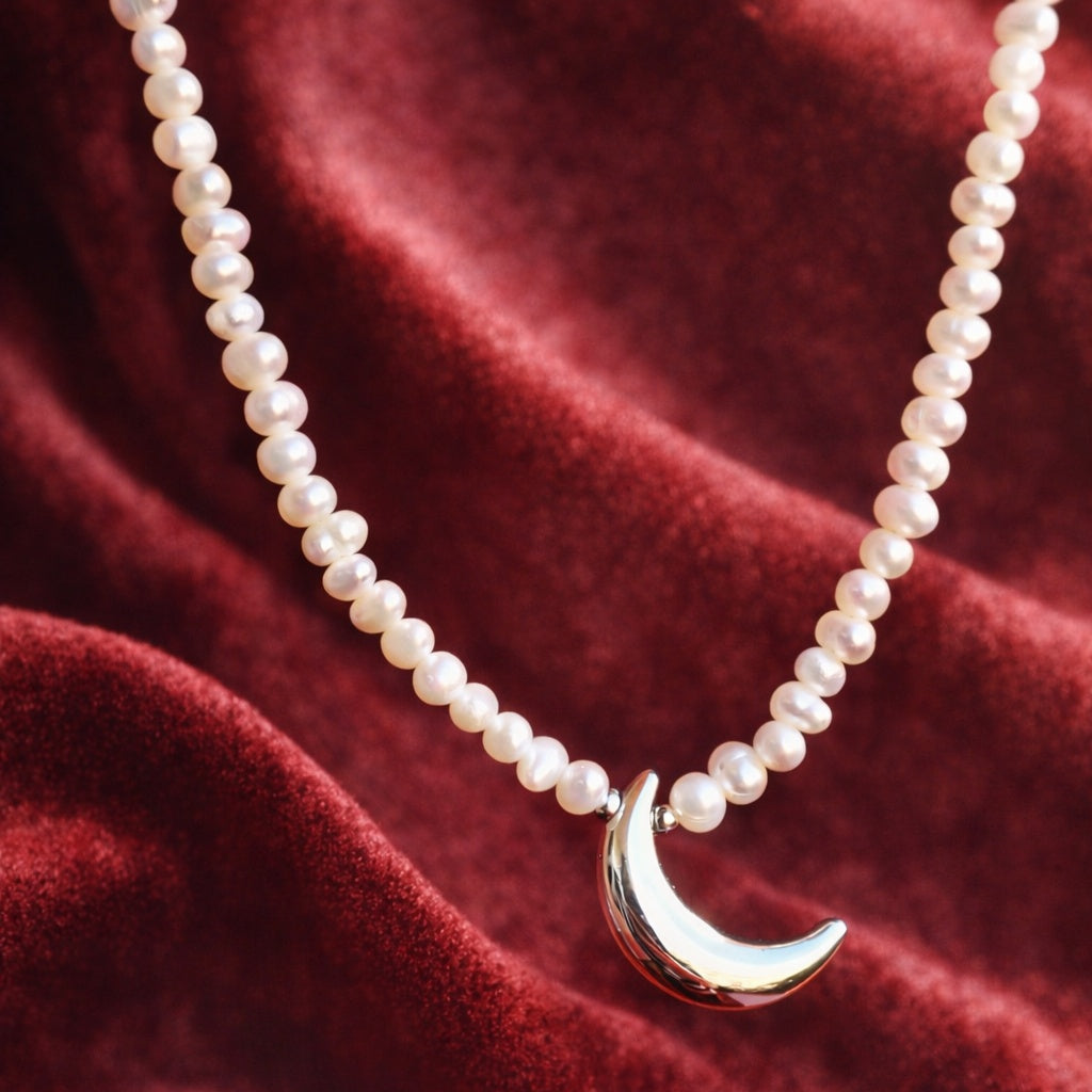 Luna crescente su perle