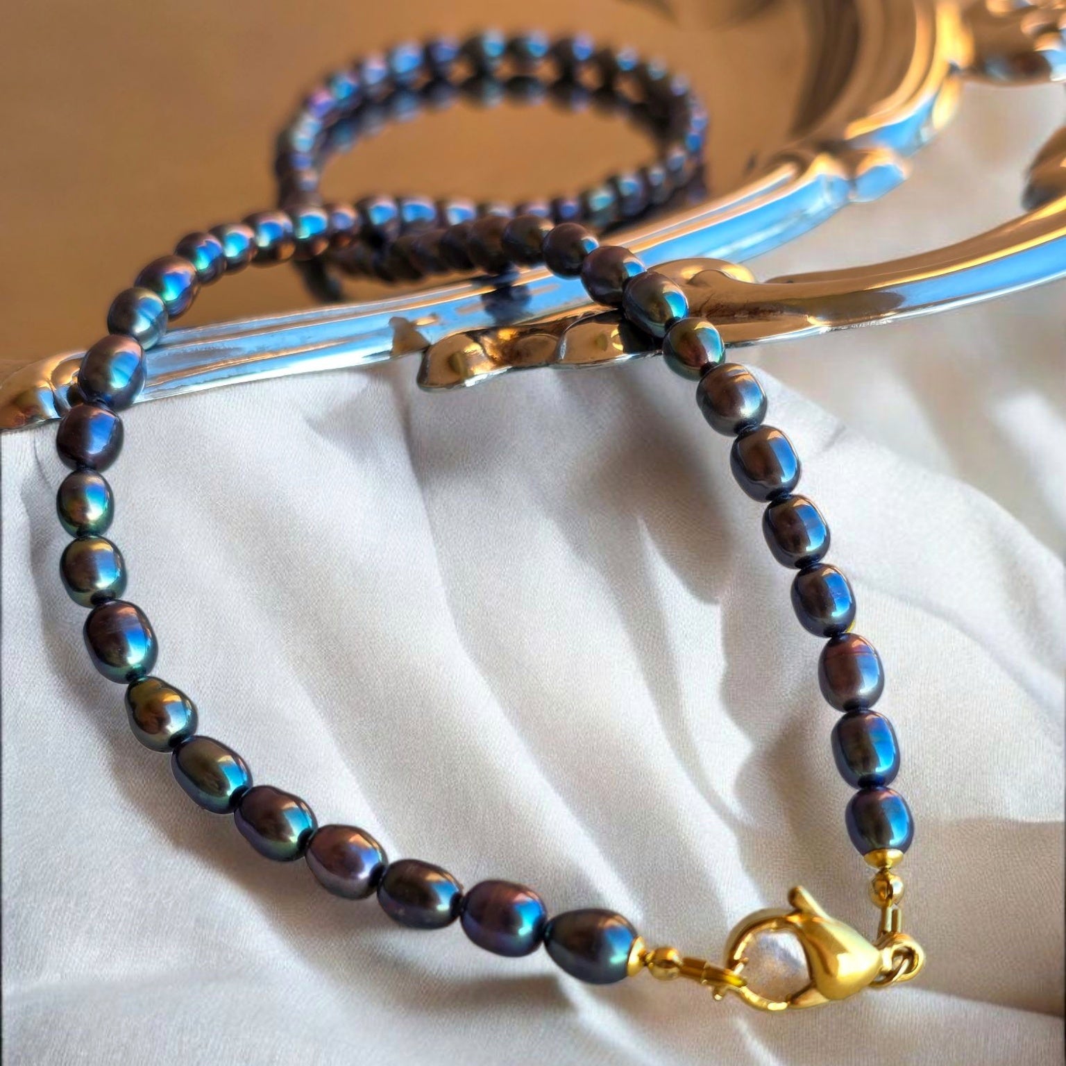 Perle di fiume nero-blu