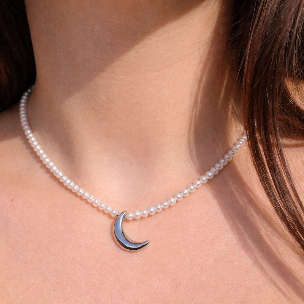Luna crescente su perle